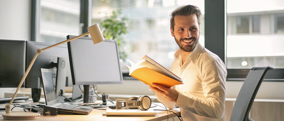 Business man smiling in office